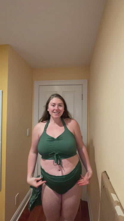 adjustable bathing suit that changes from a one piece to a two piece all